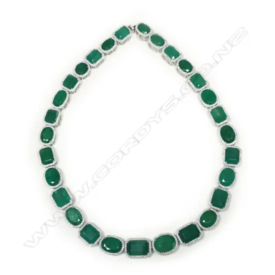 An impressive 14ct white gold emerald and diamond necklace,