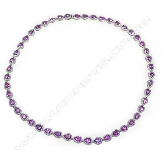 A 14ct white gold pink sapphire and diamond necklace,