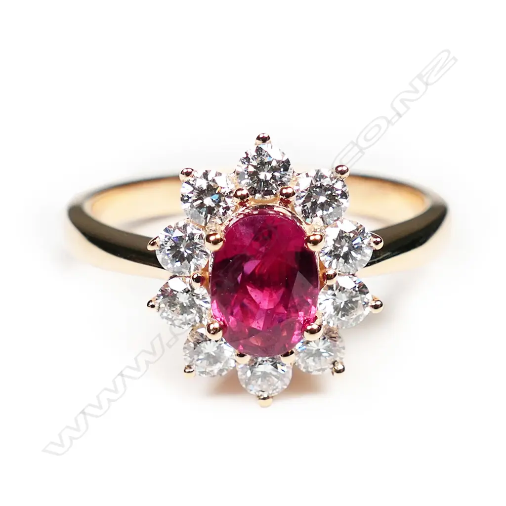 An 18ct rose gold ruby and diamond cluster ring, Image 1++