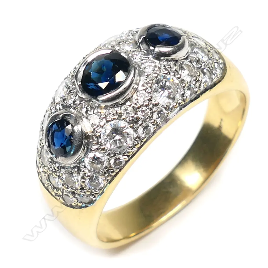 An 18ct gold, sapphire and diamond dress ring, Image 1++