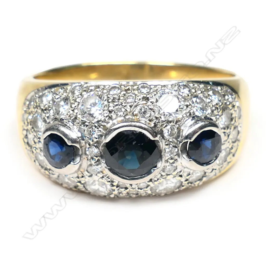 An 18ct gold, sapphire and diamond dress ring, Image 1++