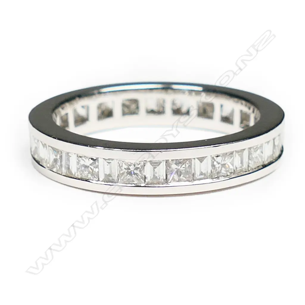 An 18ct white gold and diamond eternity band, Image 1++