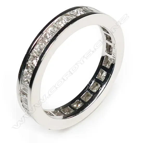 An 18ct white gold and diamond eternity band,