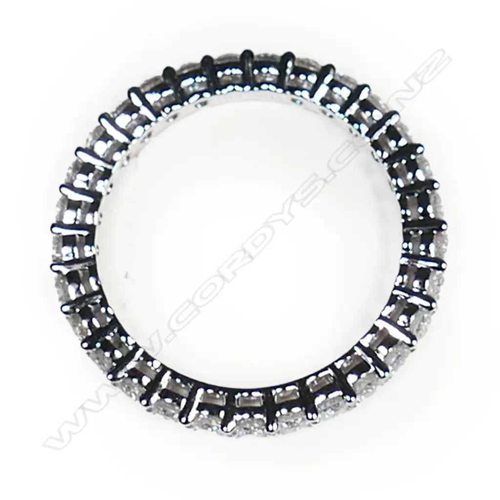 A platinum and diamond eternity band, Image 1++