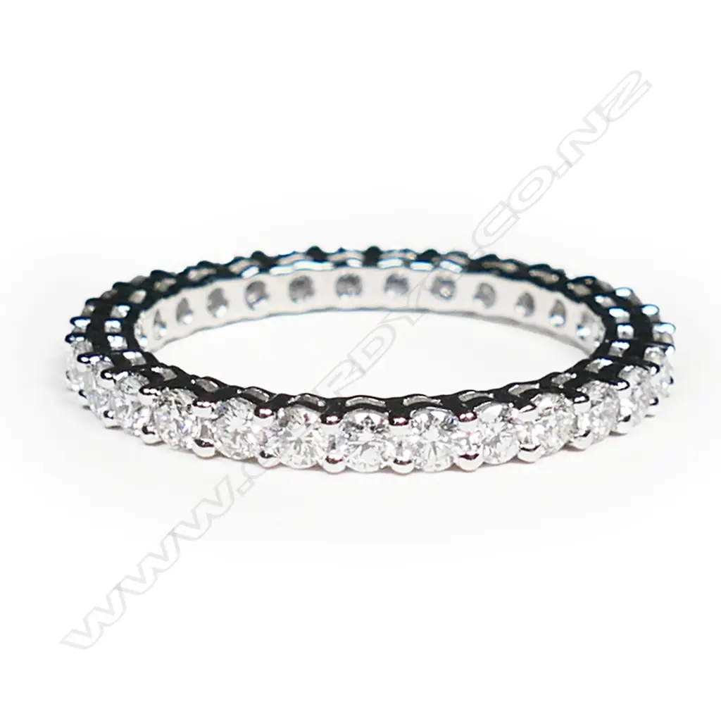 A platinum and diamond eternity band, Image 1++