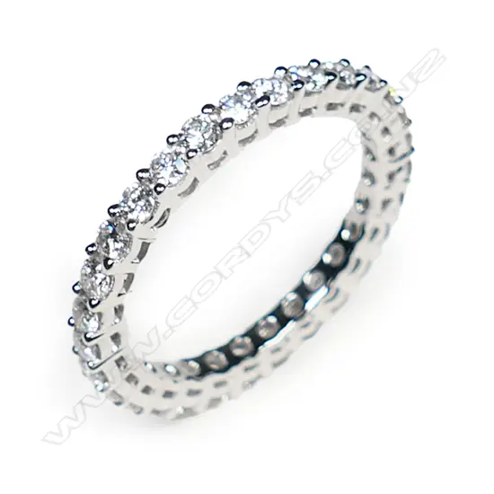 A platinum and diamond eternity band,