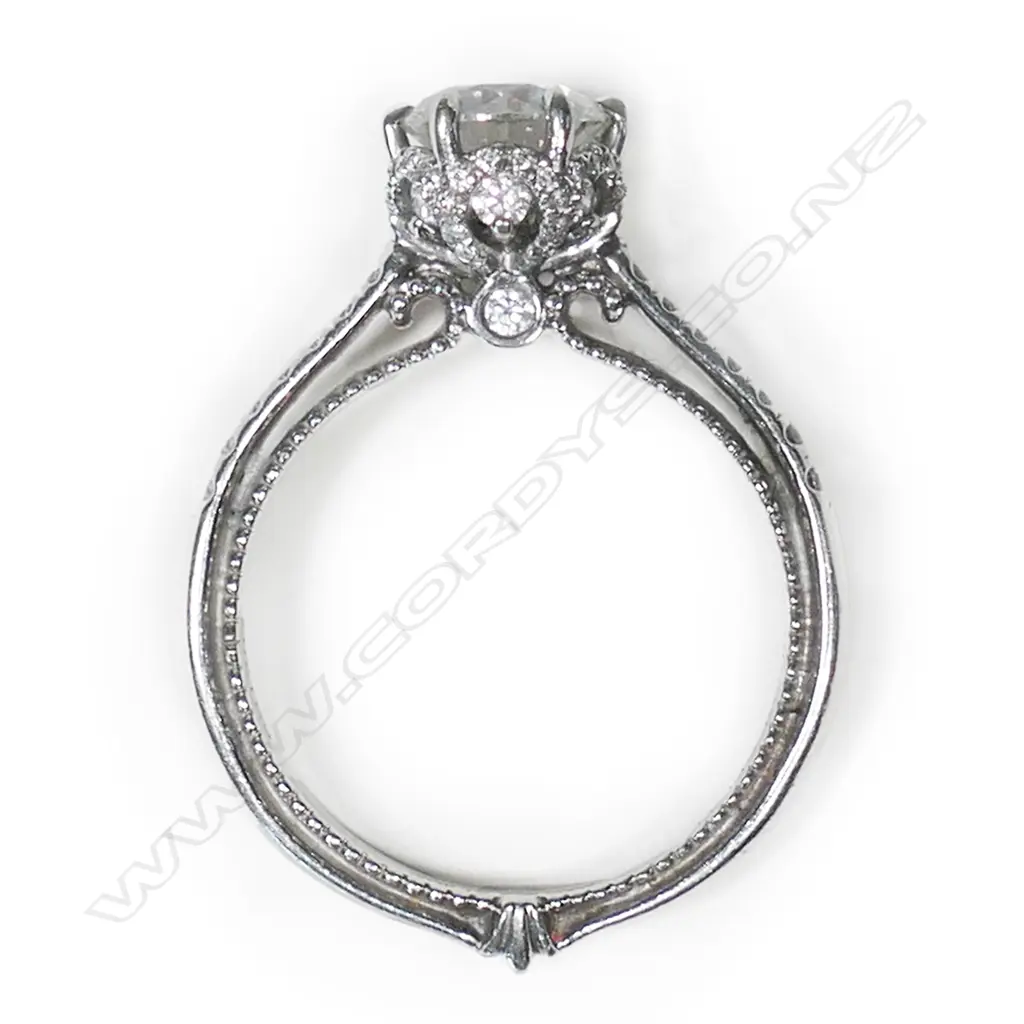 A platinum and diamond solitaire ring, Image 1++