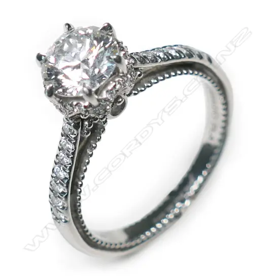 A platinum and diamond solitaire ring,