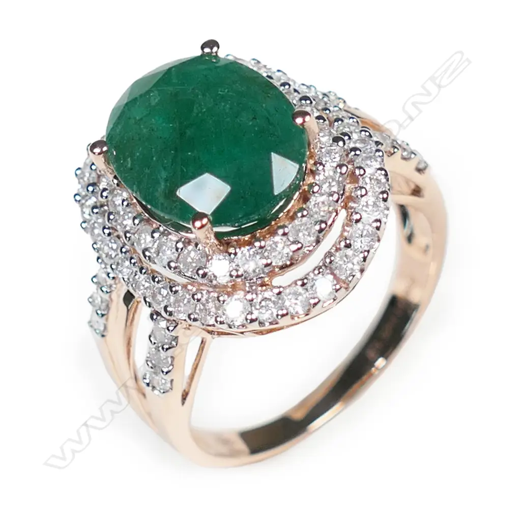 A 14ct rose gold emerald and diamond double halo ring, Image 1++