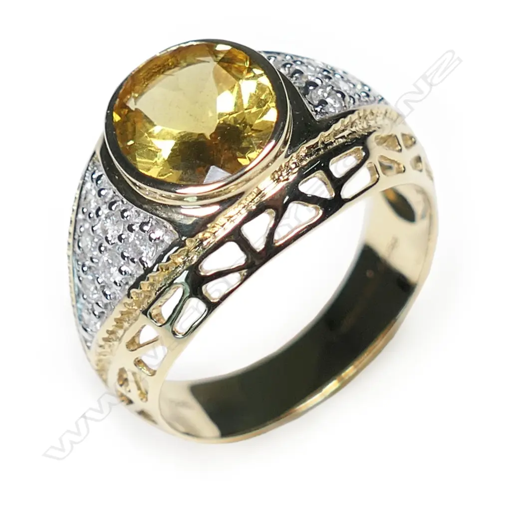 A 14ct gold heliodor and diamond dress ring, Image 1++