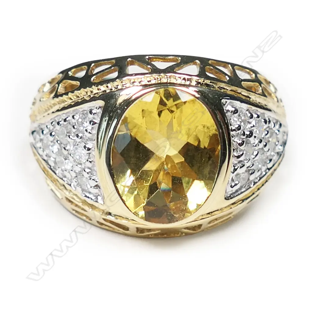 A 14ct gold heliodor and diamond dress ring, Image 1++