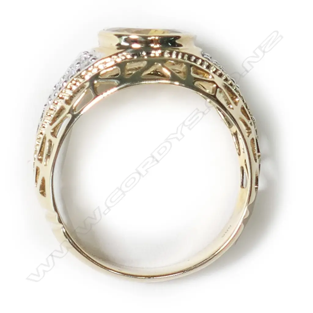 A 14ct gold heliodor and diamond dress ring, Image 1++