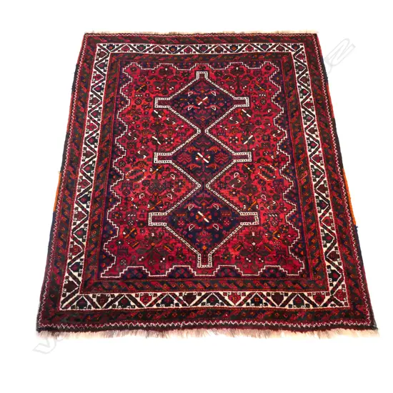 An Iranian Shirvan hand knotted all wool rug,