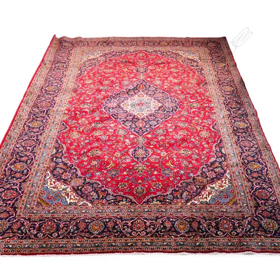 A large hand knotted Iranian Tabriz carpet,