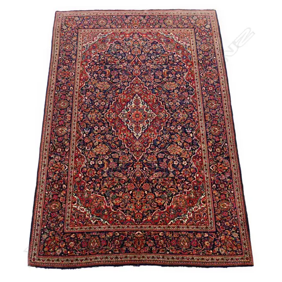 An impressive vintage hand knotted Persian Kashan carpet,