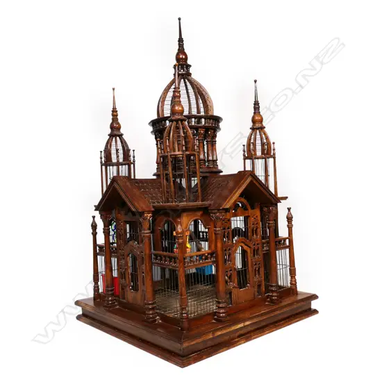 A large vintage floor standing elaborate Russian style architectural bird cage,