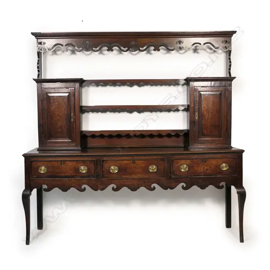 A good George lll oak and crossbanded open back Welsh dresser,