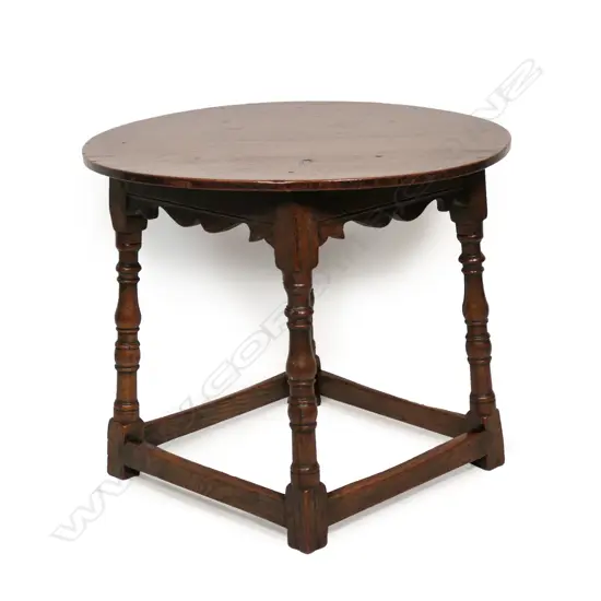 A good 19thC Georgian style country oak circular occasional table,