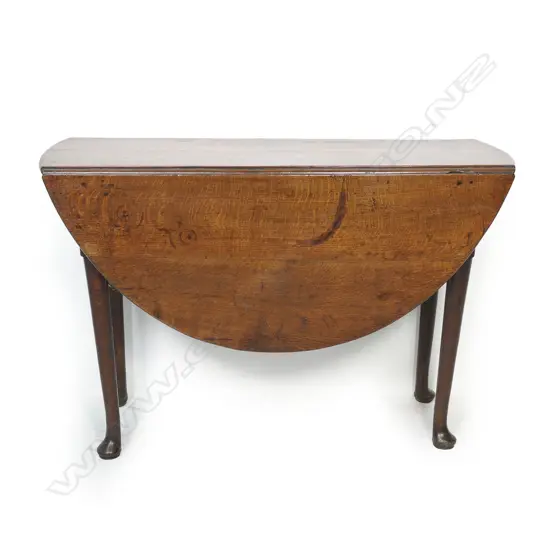 A George III oak gate leg table,