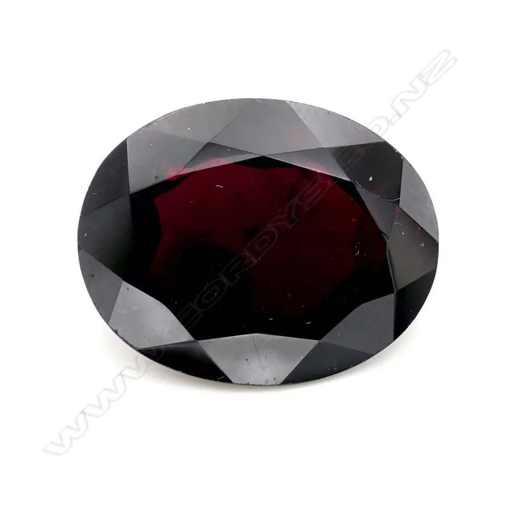 Almandine Garnet – 29ct. oval mixed cut Image 1++