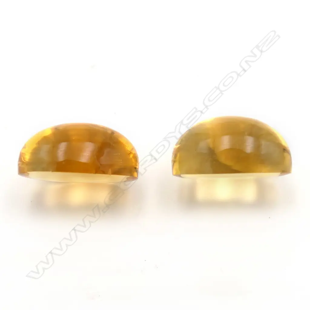 Citrine – 10.7ct. - 2 stones oval cabochon Image 1++