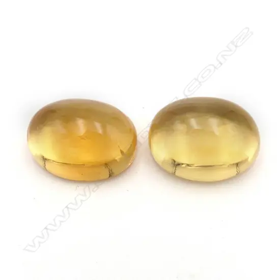 Citrine – 10.7ct. - 2 stones oval cabochon