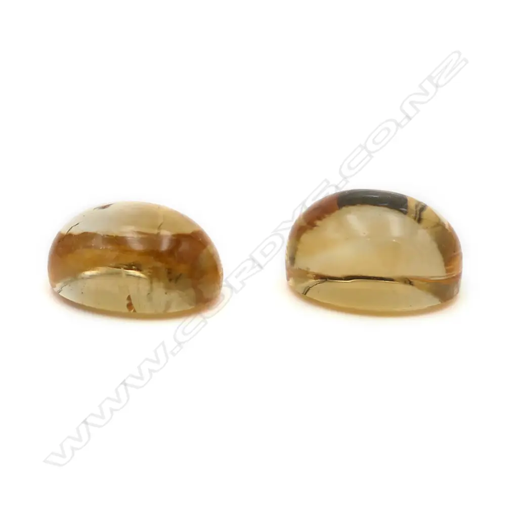 Citrine – 11.11ct. - 2 stones oval cabochon Image 1++