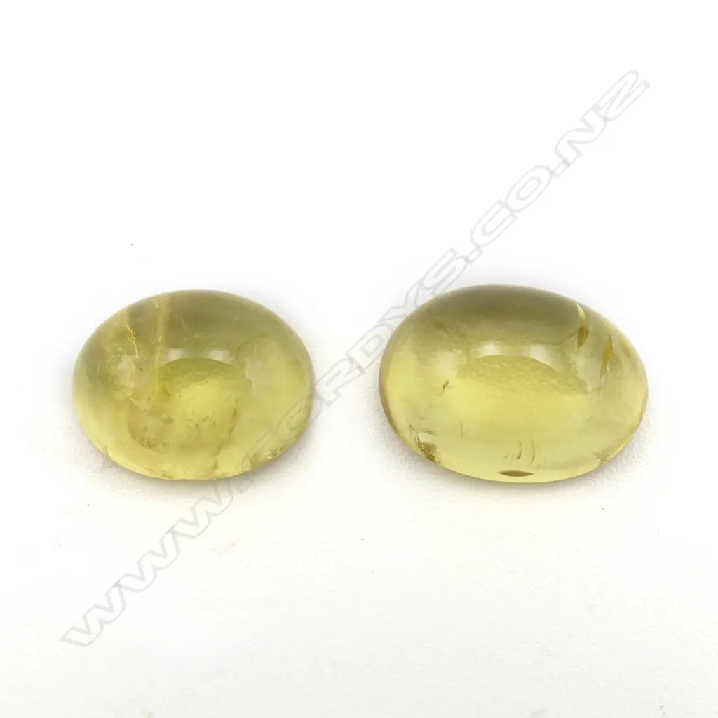 Citrine – 6.60ct. - 2 stones oval cabochon Image 1++