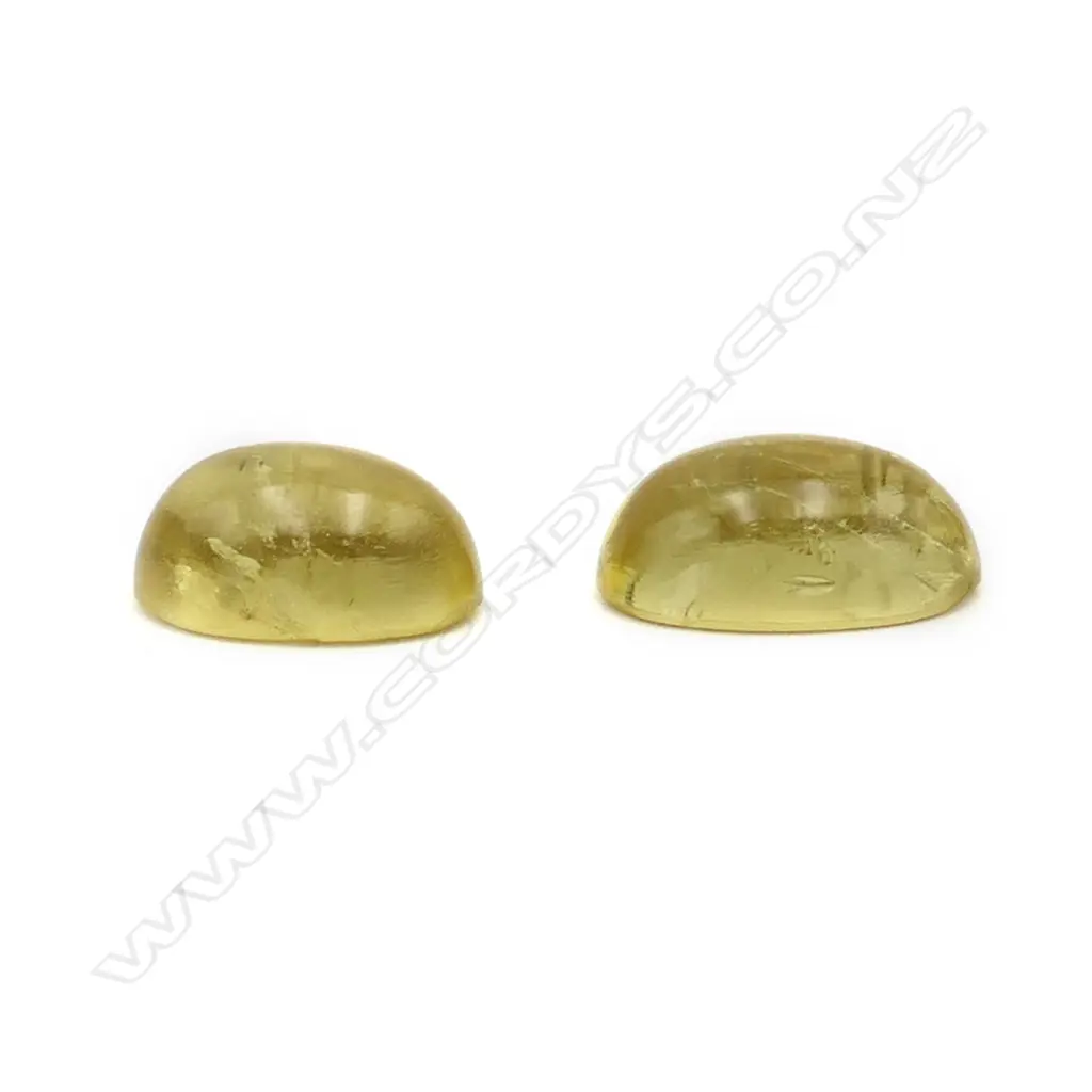 Citrine – 6.60ct. - 2 stones oval cabochon Image 1++