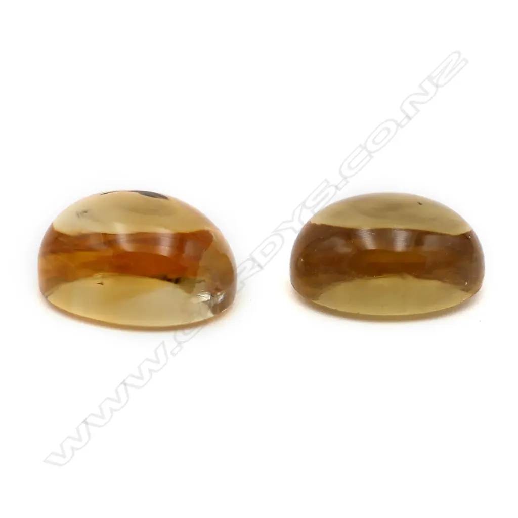 Citrine – 10.18ct. - 2 stones oval cabochon Image 1++
