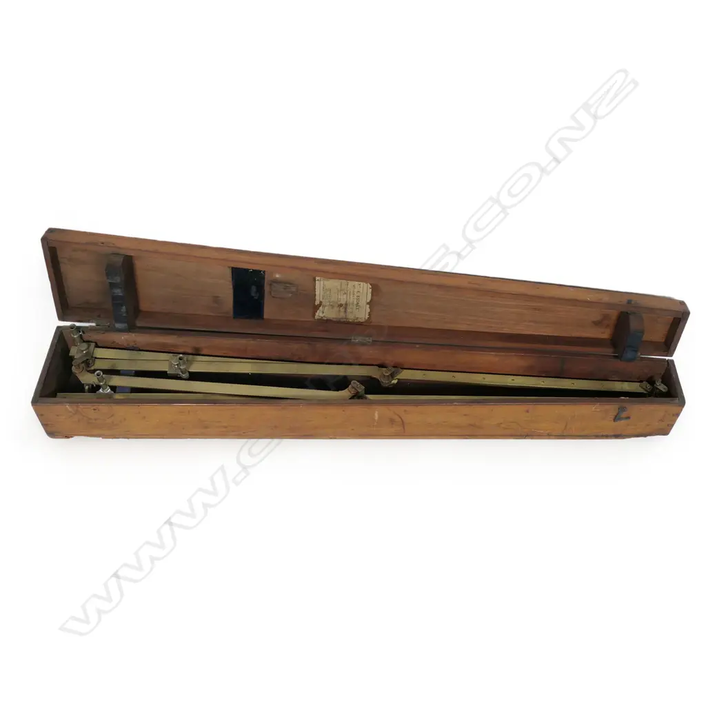 A vintage brass pantograph drawing instrument in fitted tapering teak case by Carey of London. L.960mm. Image 1++