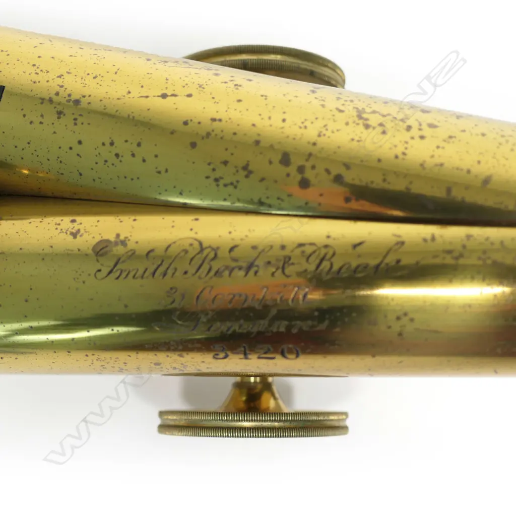 A 19thC Smith Beck & Beck of London brass binocular cased microscope, engraved maker's name to one tube and numbered 3420, multiple adjusting wheels, the original mahogany box fitted with eight lenses and other parts. H.385mm. Image 1++