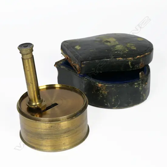 A 19thC miniature brass sextant by A. Abrahams & Co of Liverpool. Boxed (some faults).