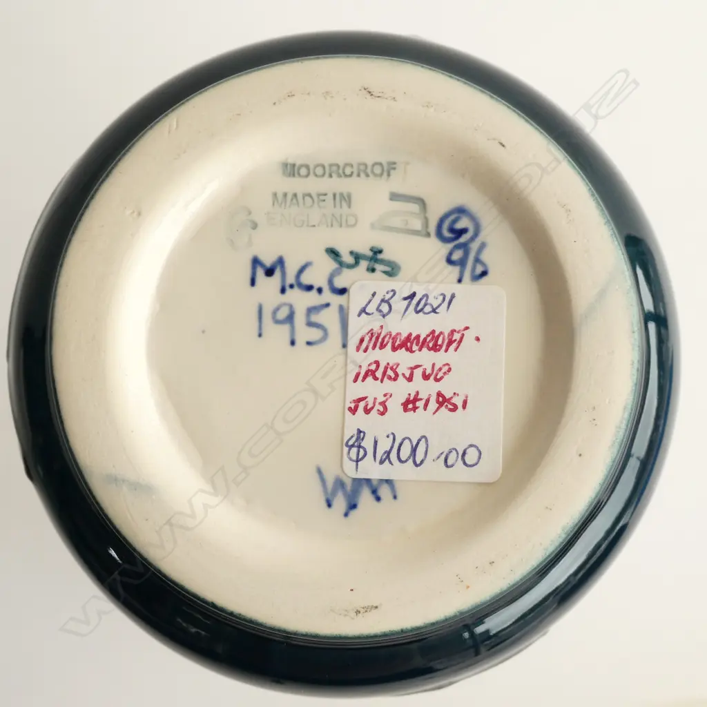 A boxed Moorcroft jug, Iris pattern, designed by Rachael Bishop c.1996 for the Moorcroft Collectors Club, shape JU3, 1951. H.240mm Image 1++