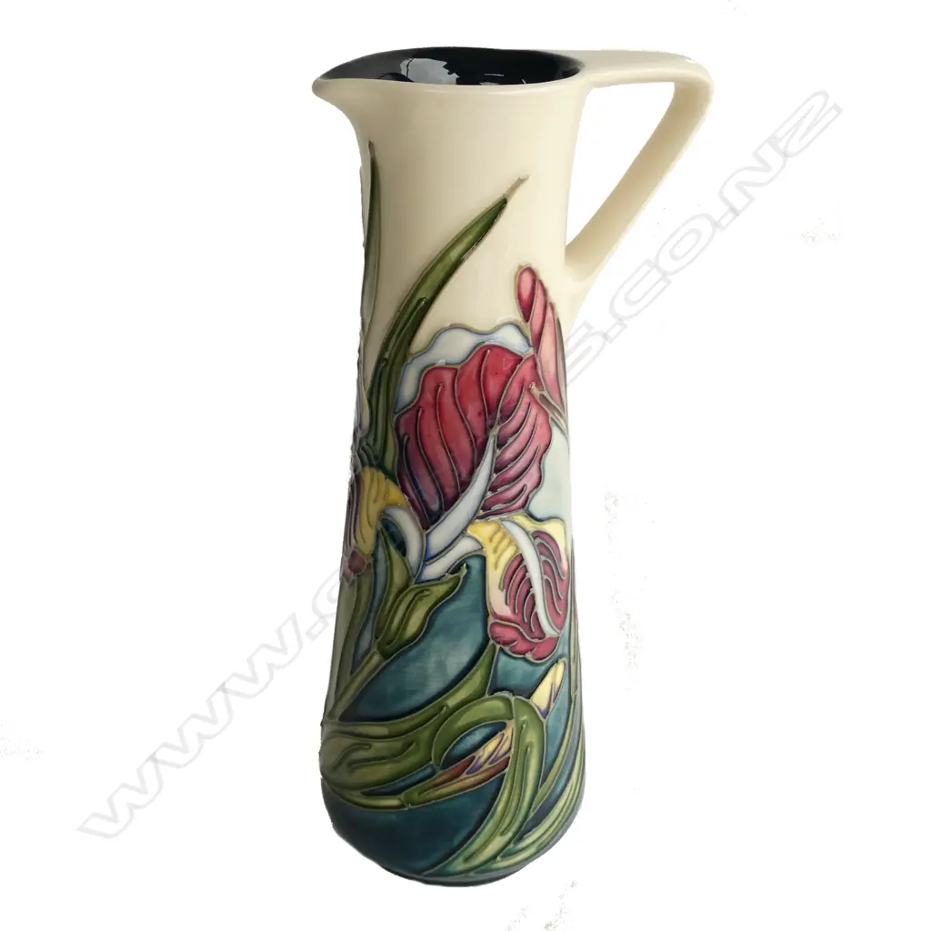 A boxed Moorcroft jug, Iris pattern, designed by Rachael Bishop c.1996 for the Moorcroft Collectors Club, shape JU3, 1951. H.240mm Image 1++
