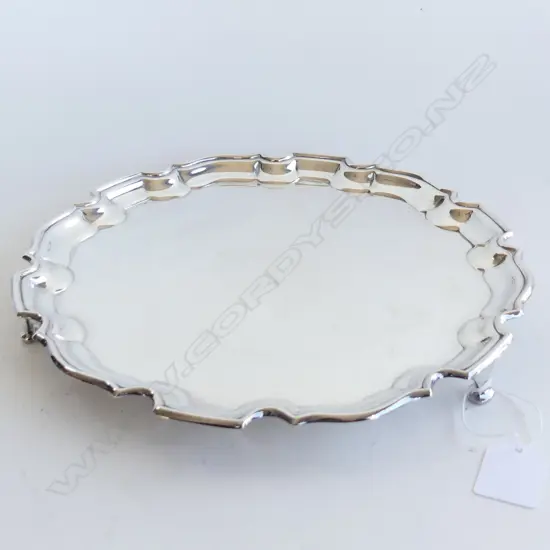 Silver salver with pie crust rim. Dia.245mm. W.550gms