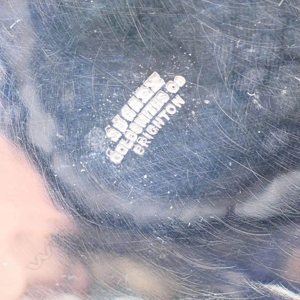 An Arts & Crafts silver tyg form vase. London 1903 by Charles Edwards for the Sussex Goldsmiths Co. Brighton, hammer finished baluster shape with three loop handles. H.145mm. 456gms. Image 1++