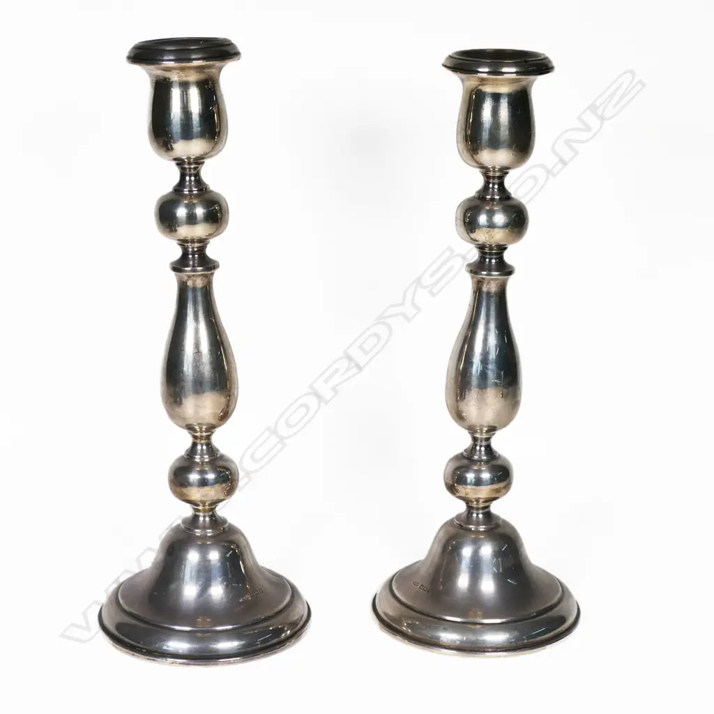 A pair of silver Birmingham baluster column candlesticks. H.275mm. Weighted bases. Image 1++