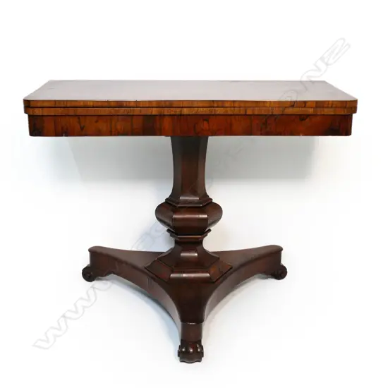 A Regency rosewood supper table,  flap top, raised on a hexagonal baluster column and tripod base with scrolling feet.