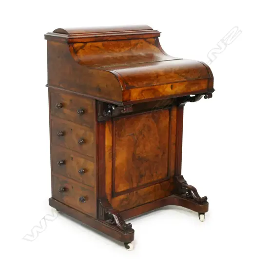 A good Victorian figured walnut davenport, the top with rise and fall stationery compartment, the front hinged lid with sliding and fitted interior, leather insert, traditionally with four drawers to the right side. H.910mm