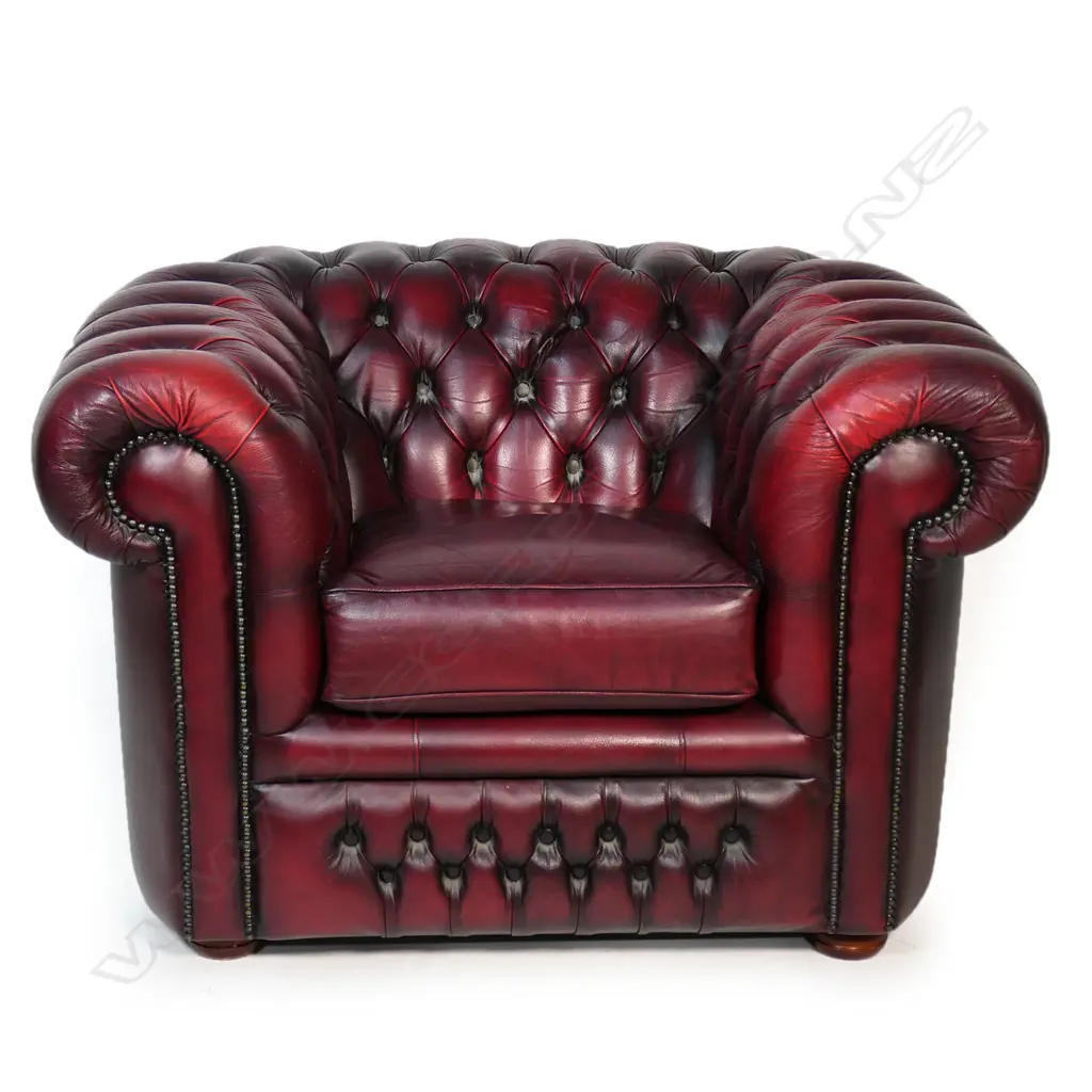 A pair of Gascoigne Chesterfield tub chairs, upholstered in burgundy leather with button-backs. 1100 x 940 x 760mm. Handmade by Gascoigne Leather Centre - an Australian furniture company. Image 1++