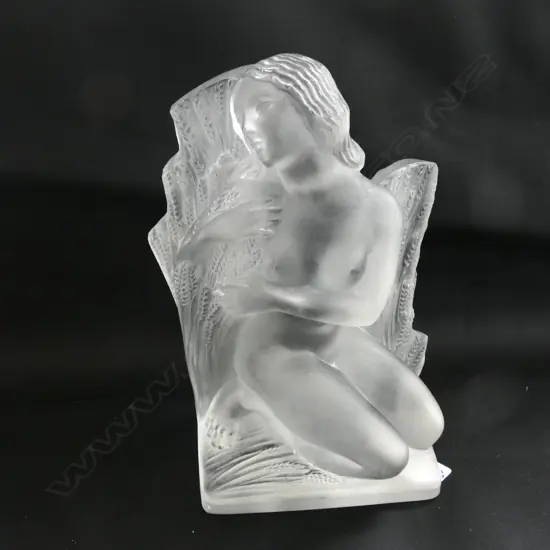 A Lalique clear frosted glass female nude statuette "Eté" (Summer)