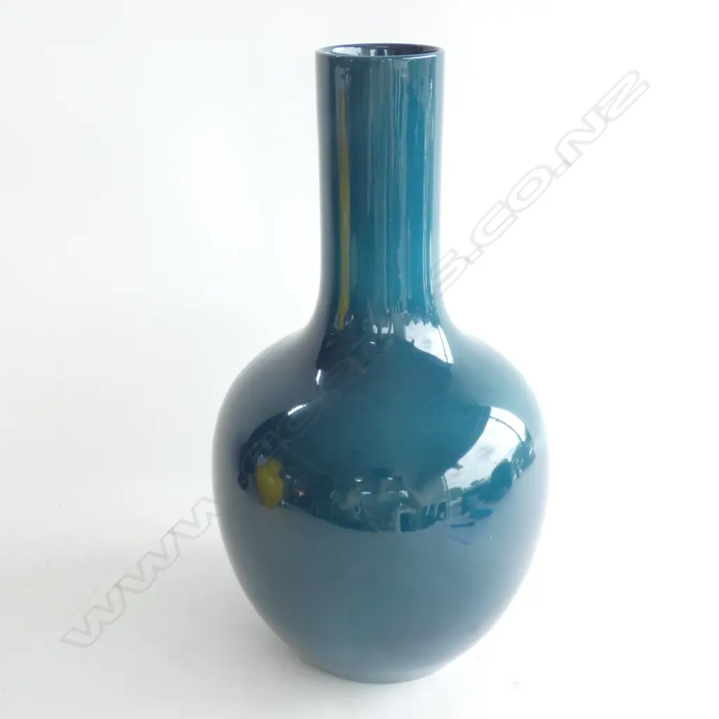 A large Royal Doulton monochrome deep teal flambé bottle vase Image 1++