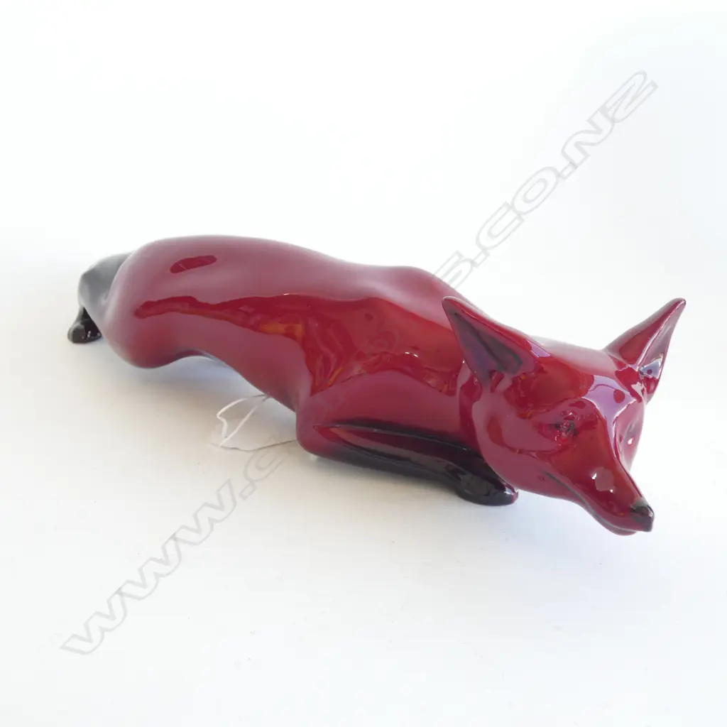 A large Royal Doulton flambe stalking fox, signed Noke (under the tail) Image 1++