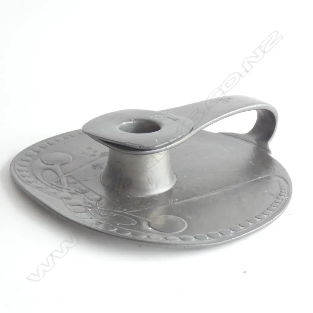 An English Pewter chamberstick designed by Archibald Knox Image 1++