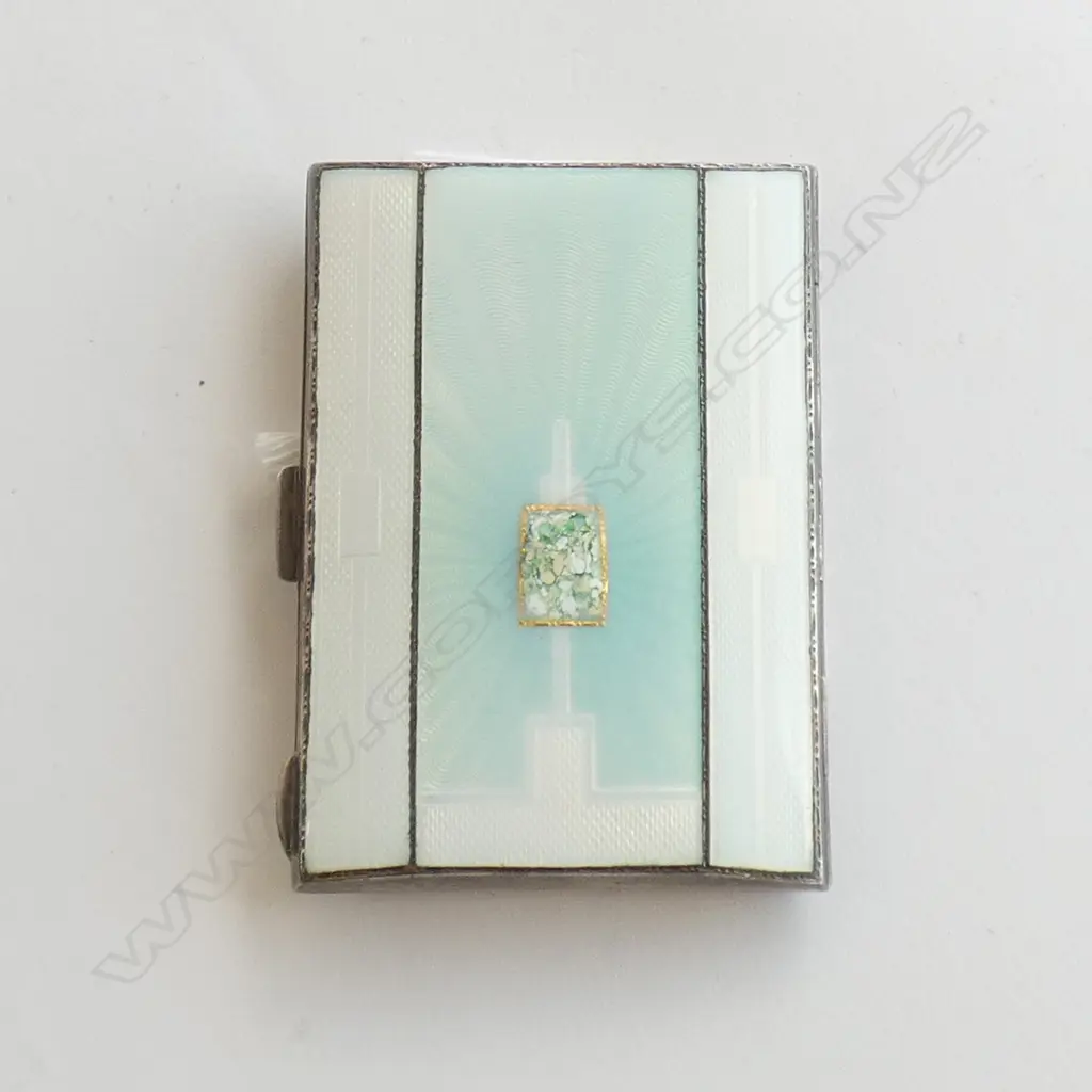 An elegant small silver and enamel cigarette case Image 1++