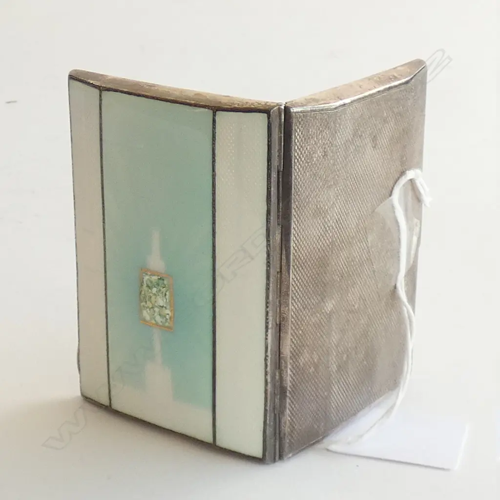 An elegant small silver and enamel cigarette case Image 1++