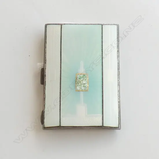 An elegant small silver and enamel cigarette case