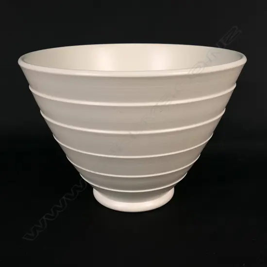 A Wedgwood Keith Murray vase, conical shape with six lathe turned bands
