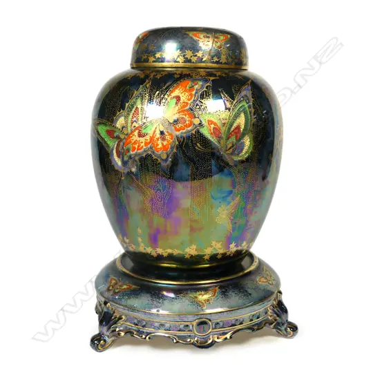 A Crown Devon 'Rural Lusterine' lidded ginder jar on matched stand,